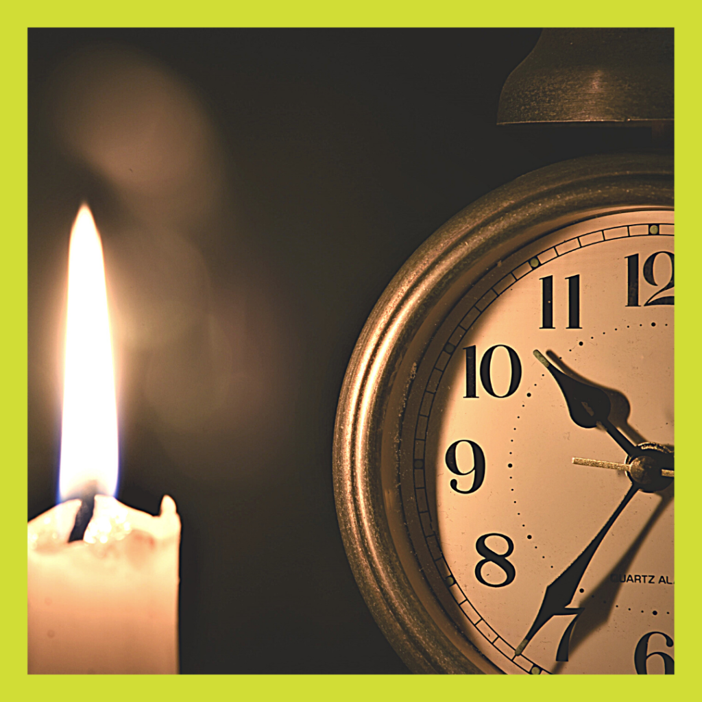 Clock and candle for 6 Steps For Better Sleep article